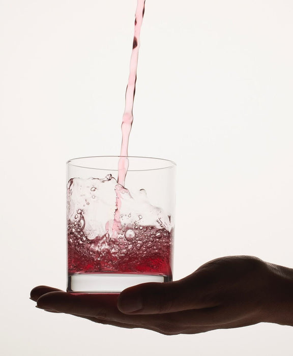 Glass of collagen drink representing a daily collagen supplement routine for skin health and healthy ageing