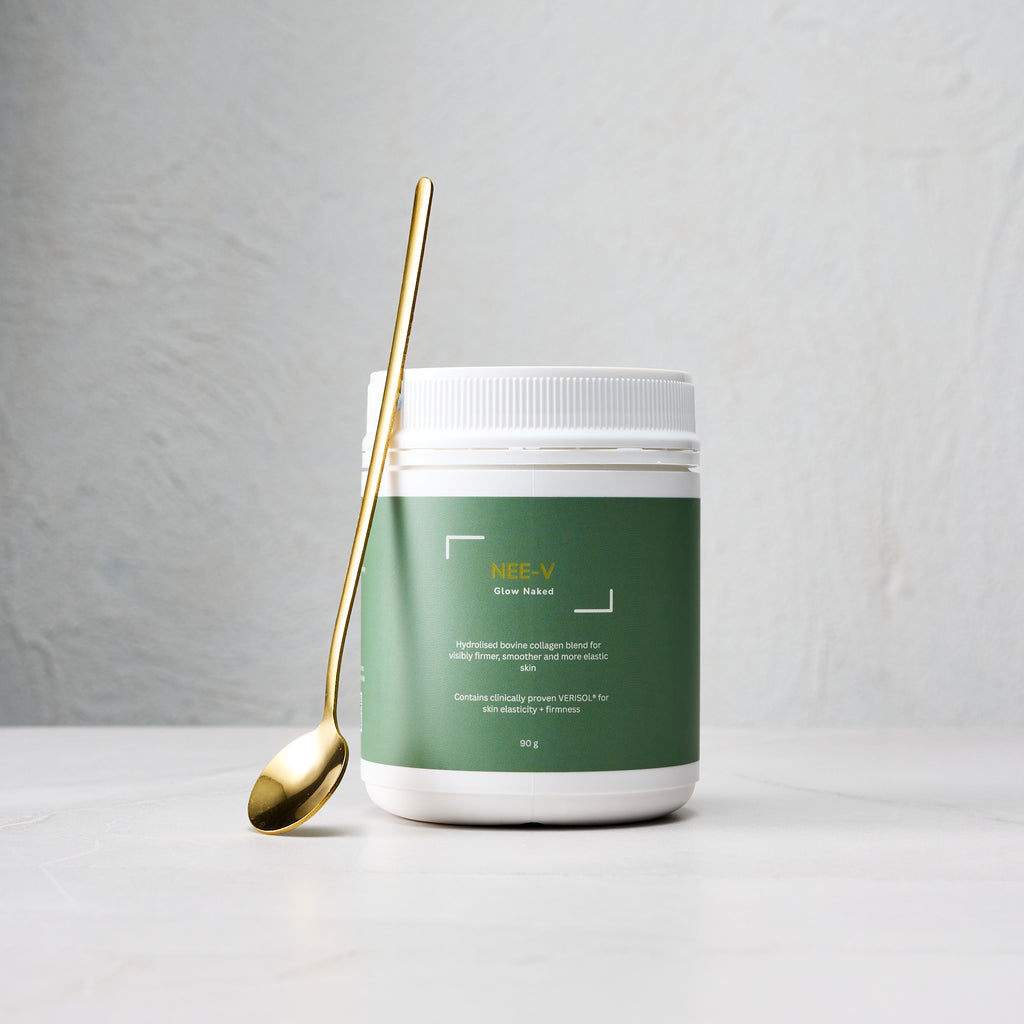 NEE-V Glow Naked unflavoured collagen supplement with antique gold measuring spoon featuring clinically researched VERISOL® collagen peptides.